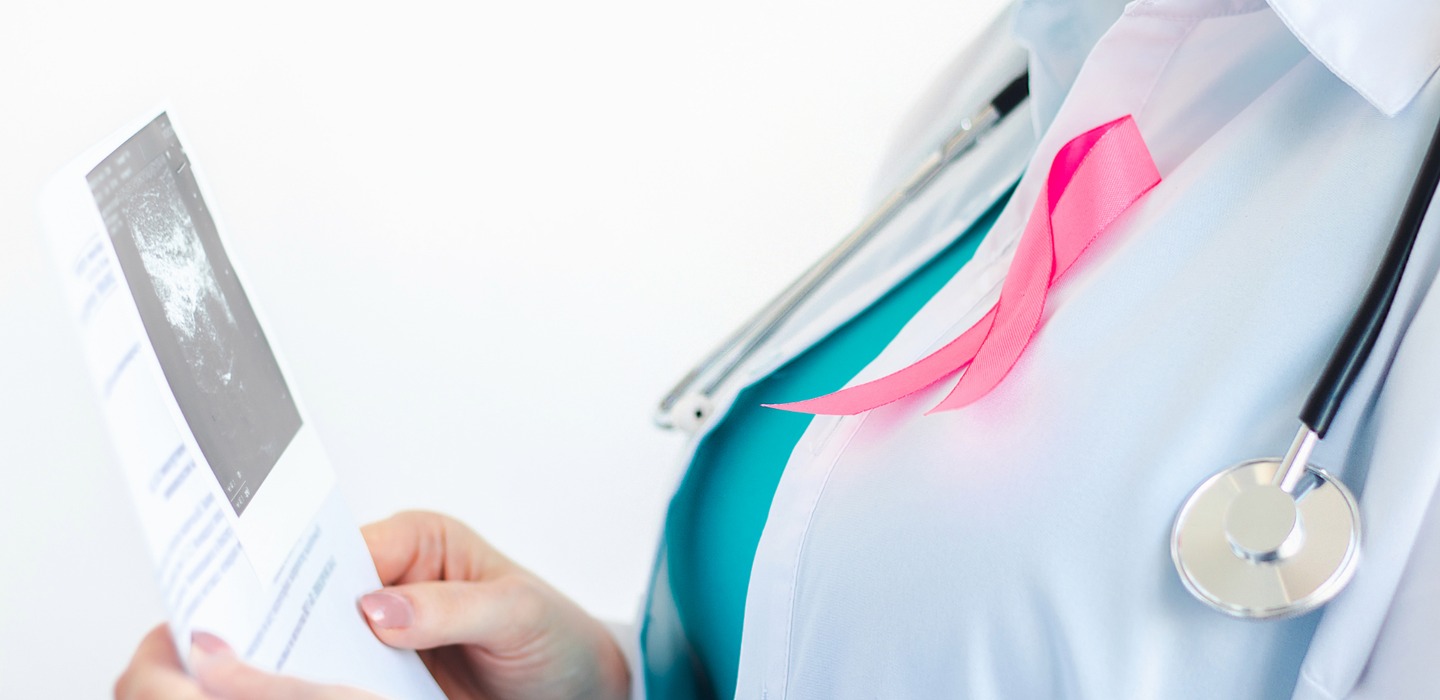 Woman doctor examining scan with pink ribbon 2026 09 24 07 24 37 utc 1